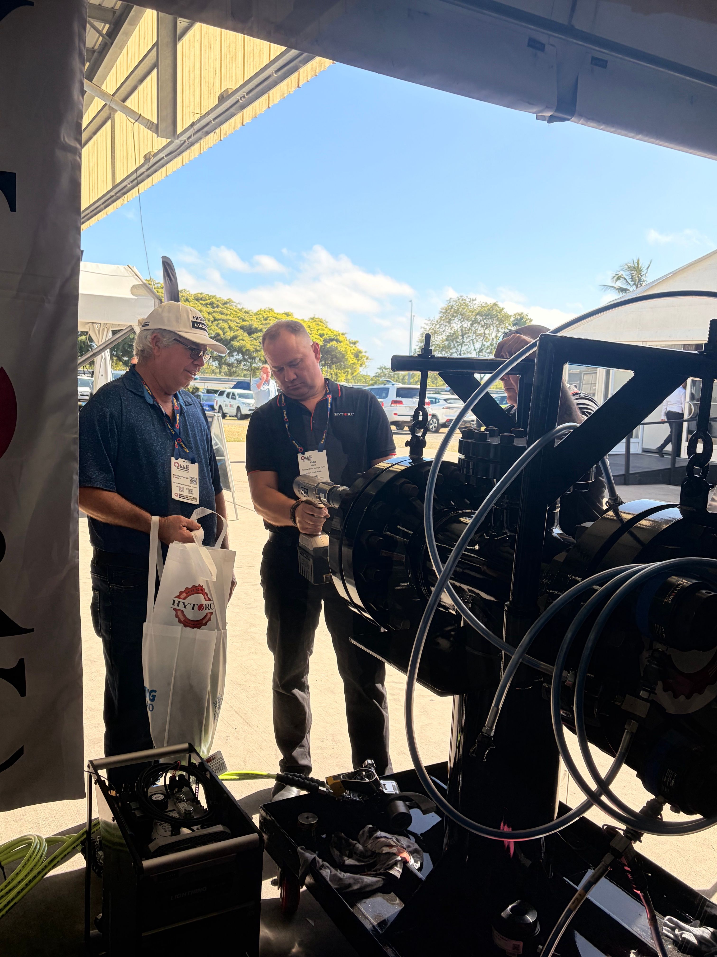 HYTORC Australia Queensland Mining & Engineering Exhibition people doing bolting torque tool demonstration