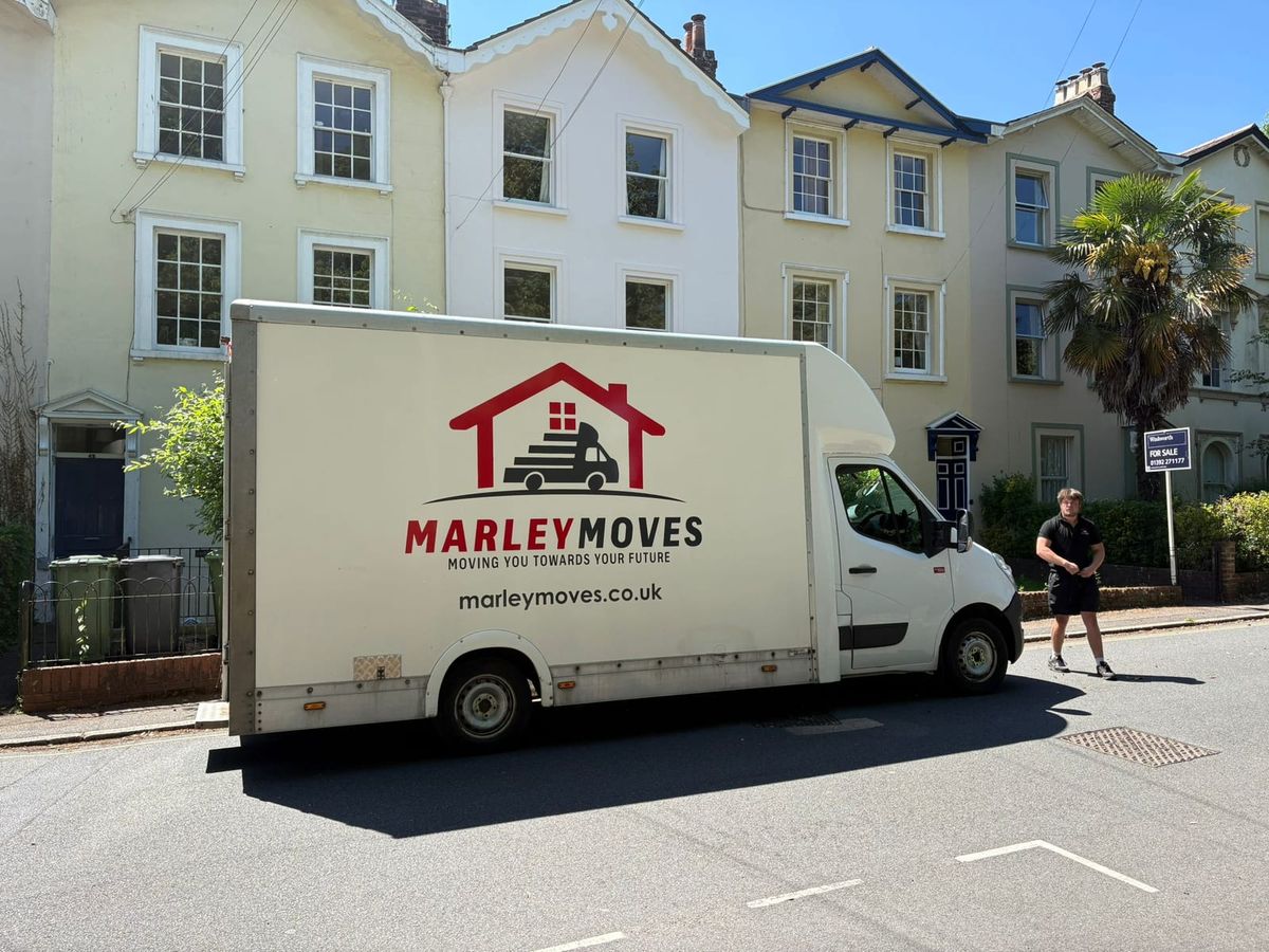 Marley Moves removals van outside a house