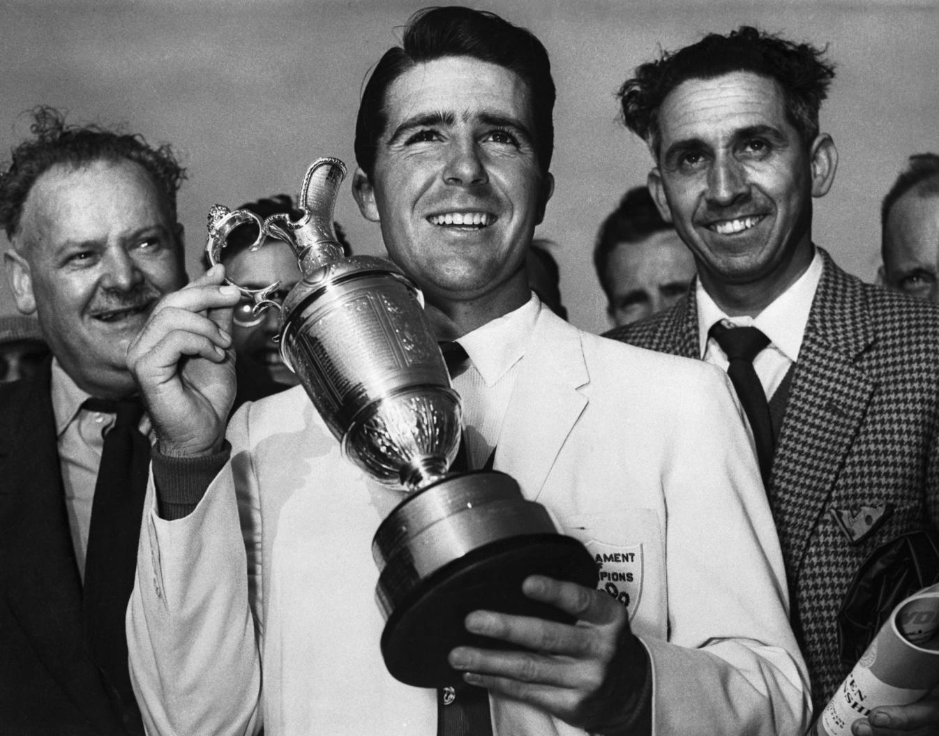 Gary Player holding the Claret Jug after winning the 1959 Open Championship.