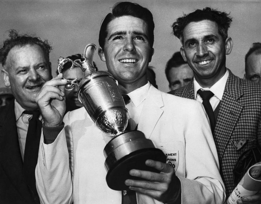 Gary Player holding the Claret Jug after winning the 1959 Open Championship.