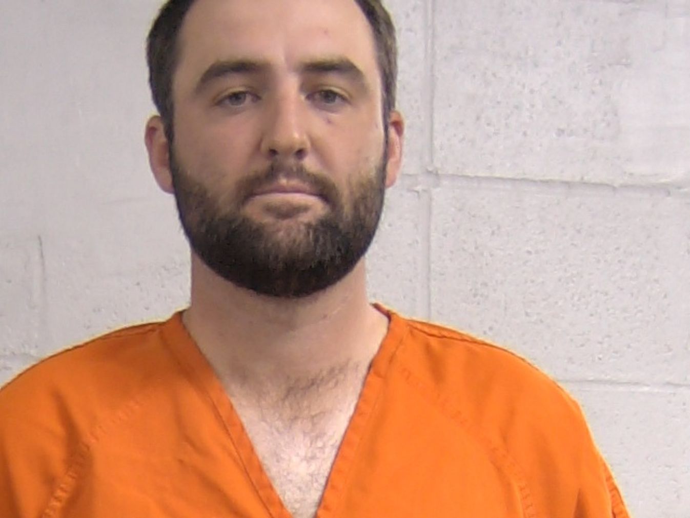 Scottie Scheffler's mug shot after being arrested outside Valhalla Golf Club.