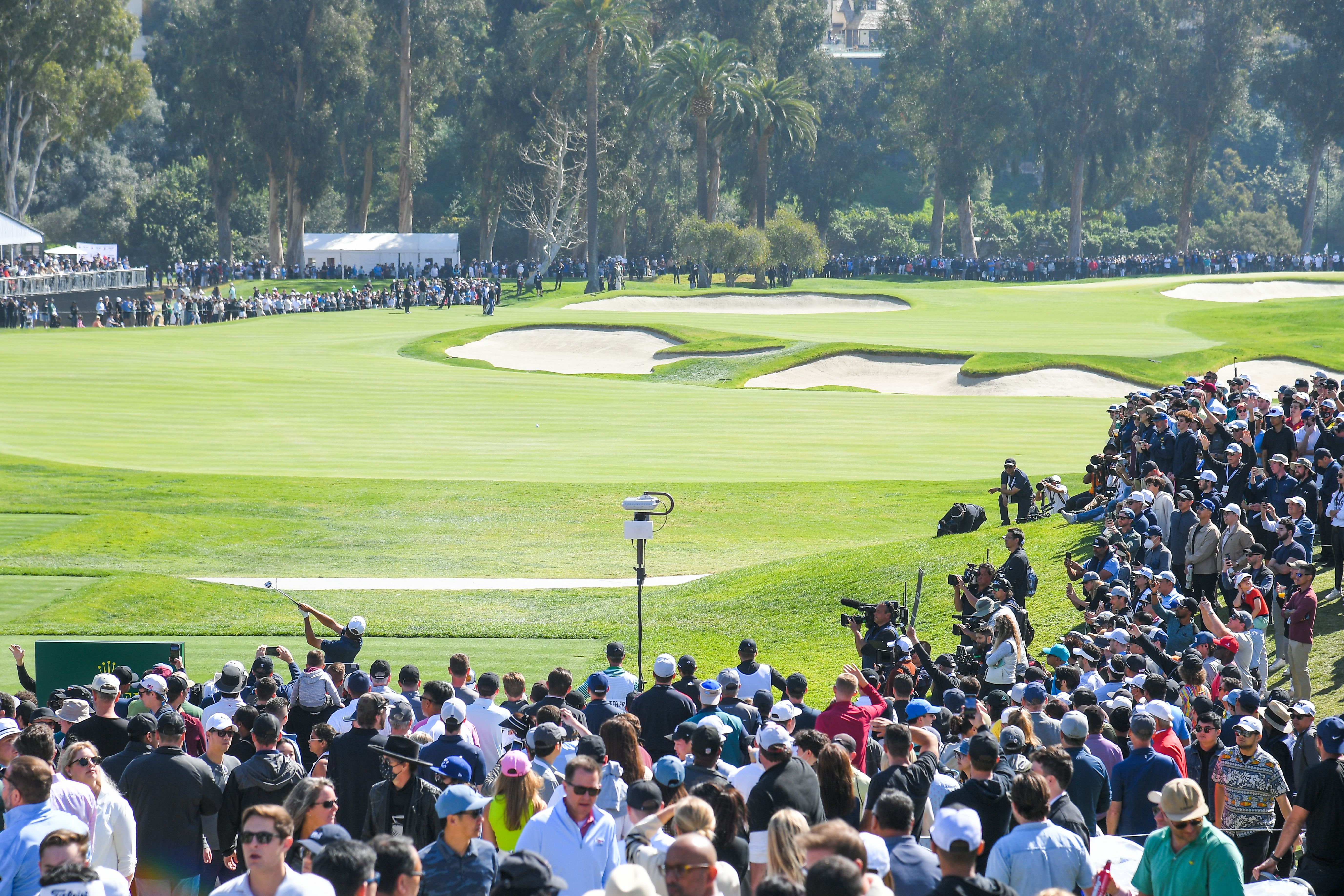 Scottie Scheffler tees off on the 10th hole at Riviera.