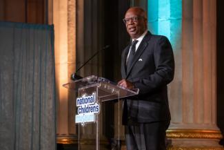Jermaine Johnson on stage at the National Children's Museum Play Soiree