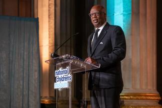 Jermaine Johnson on stage at the National Children's Museum Play Soiree