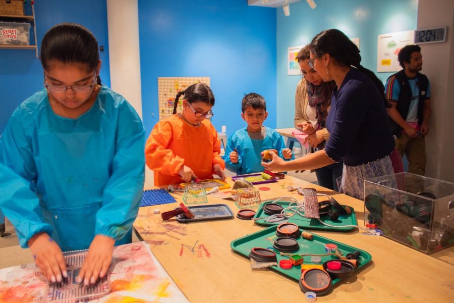 family creates prints with Tinkerer-in-Residence, Chitra Sharma