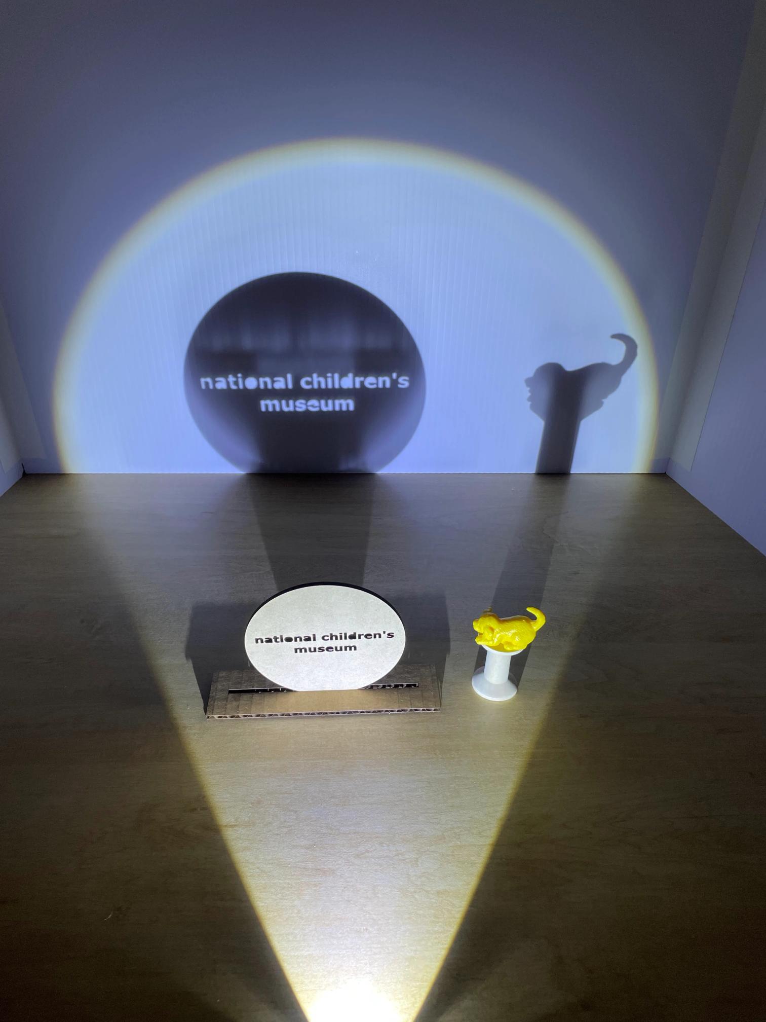 image of a shadow cast on a background from a flashlight