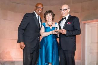 Jermaine Johnson, Kiryn Hoffman, and Victor Hoskins on stage at the National Children's Museum Play Soiree