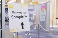 Display Poster with and arrow directing attendees and text "This Way to Sample It" 