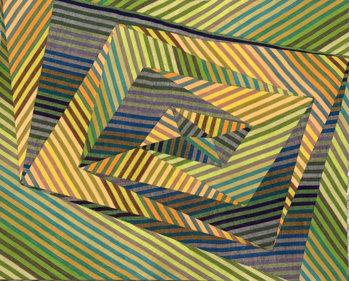 A vibrant quilt featuring a series of colorful, vertical and horizontal stripes in various hues.