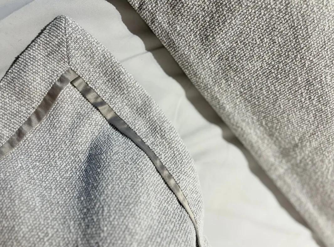 What Is Bouclé Fabric? The Texture Behind the World's Cosiest Cushions