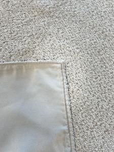 Ivory Speckled Bouclé Throw with Satin Border