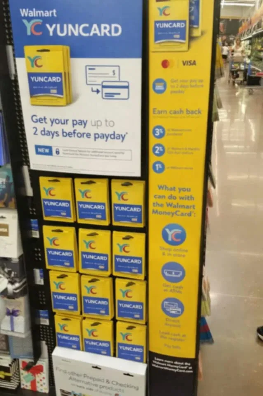 Fabricated Walmart store display showing Yuncard packs, an AI-generated image used to make a fake gift card look legitimate