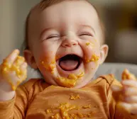 When do babies start laughing?