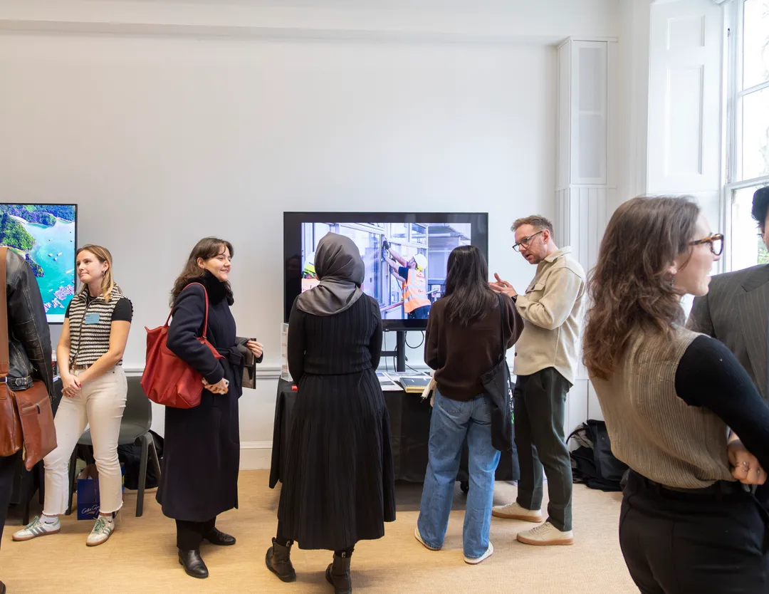 Architect talking to students