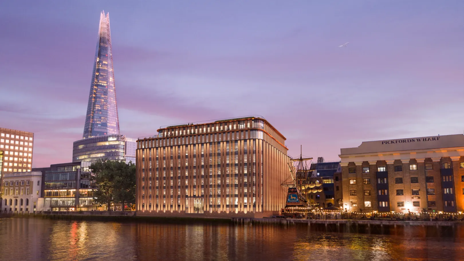 CGI render of large renovated building on the river Thames with the Shard in the background