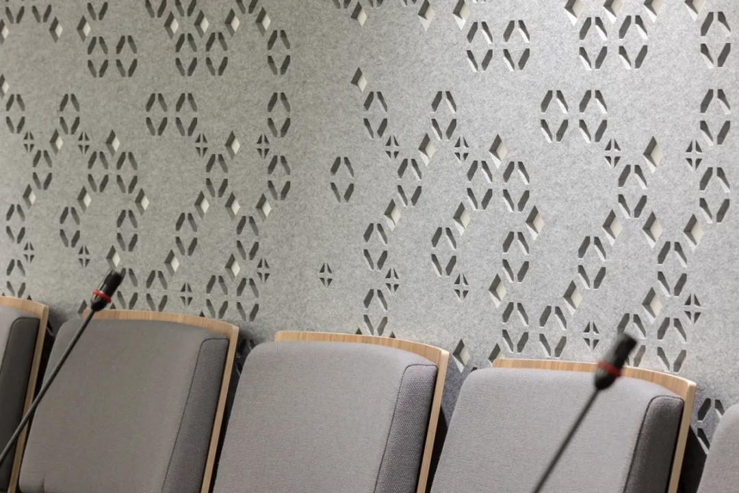 details of ornaments in acoustic felt lining the walls