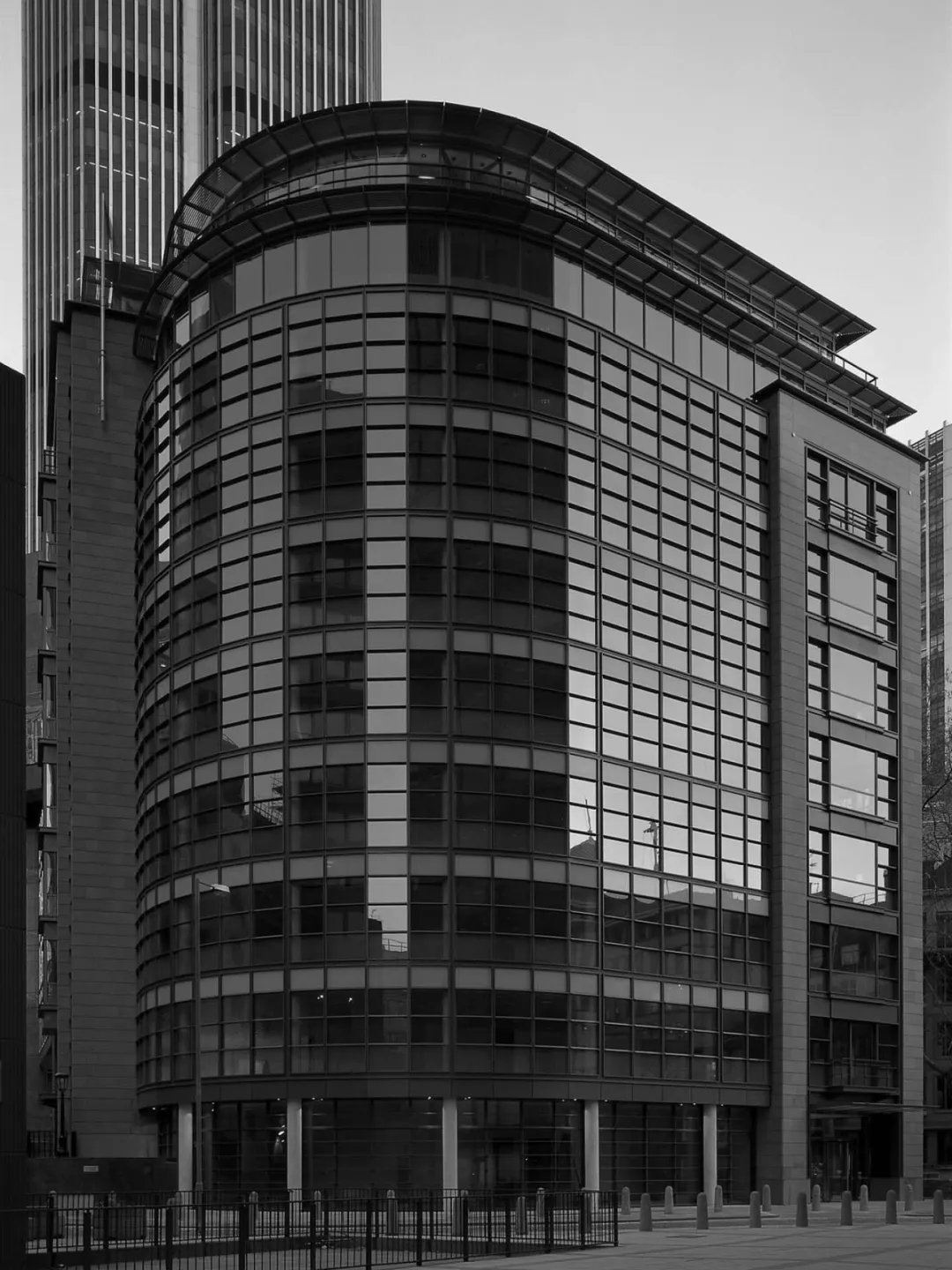 A black and white image of the original office tower One Great St Helen's