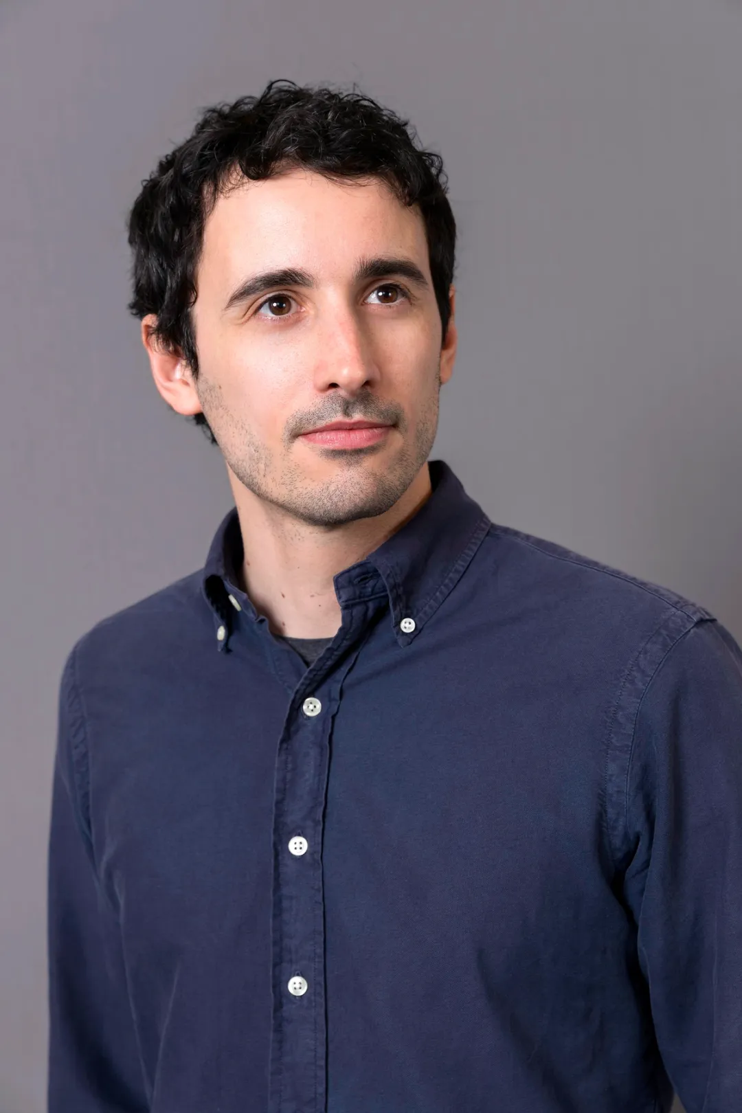 Portrait of Marco, close up, man in blue shirt