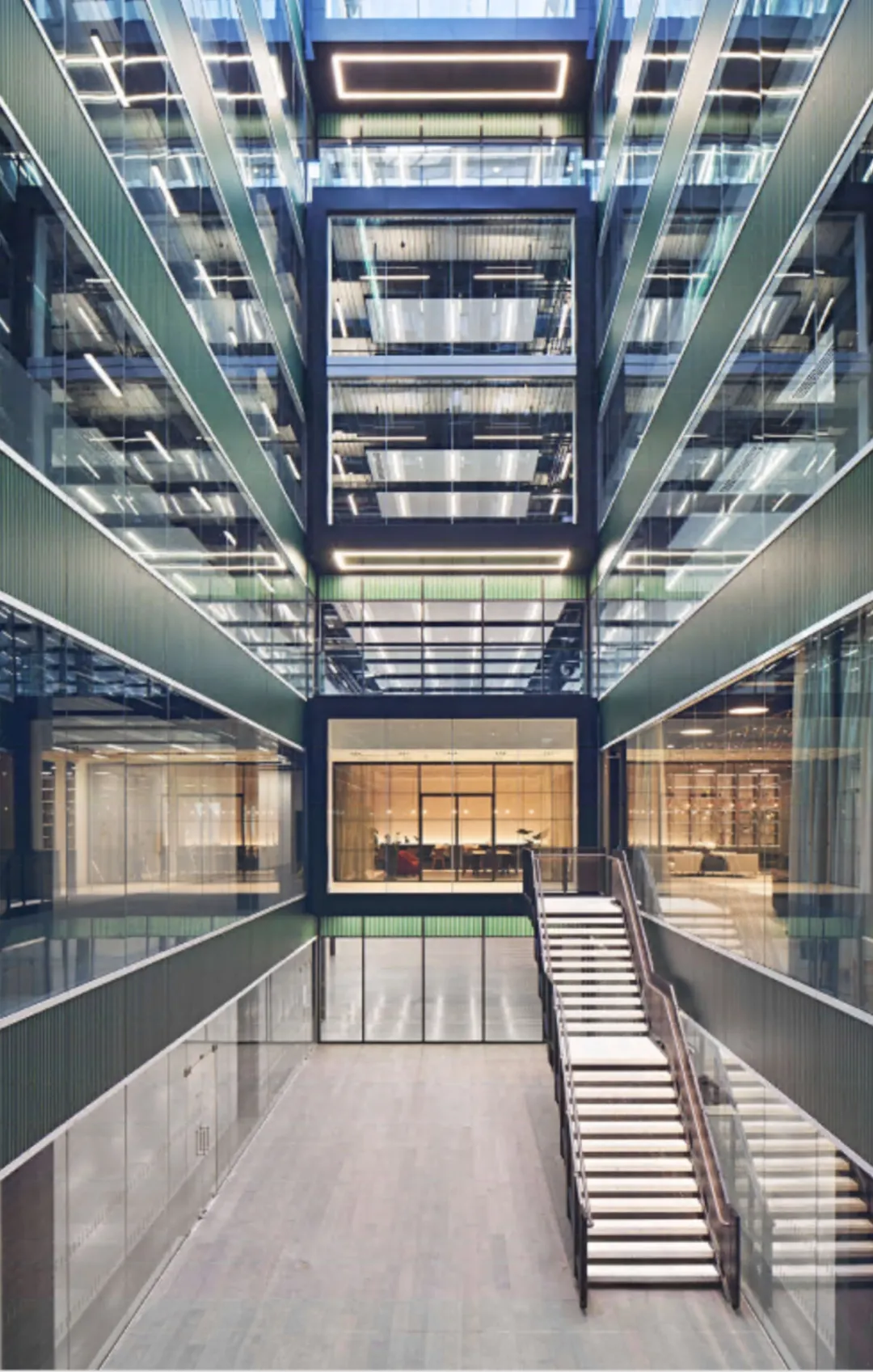 green atrium view of building with stairs