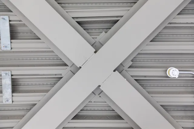 detail of office ceiling with pipes exposed