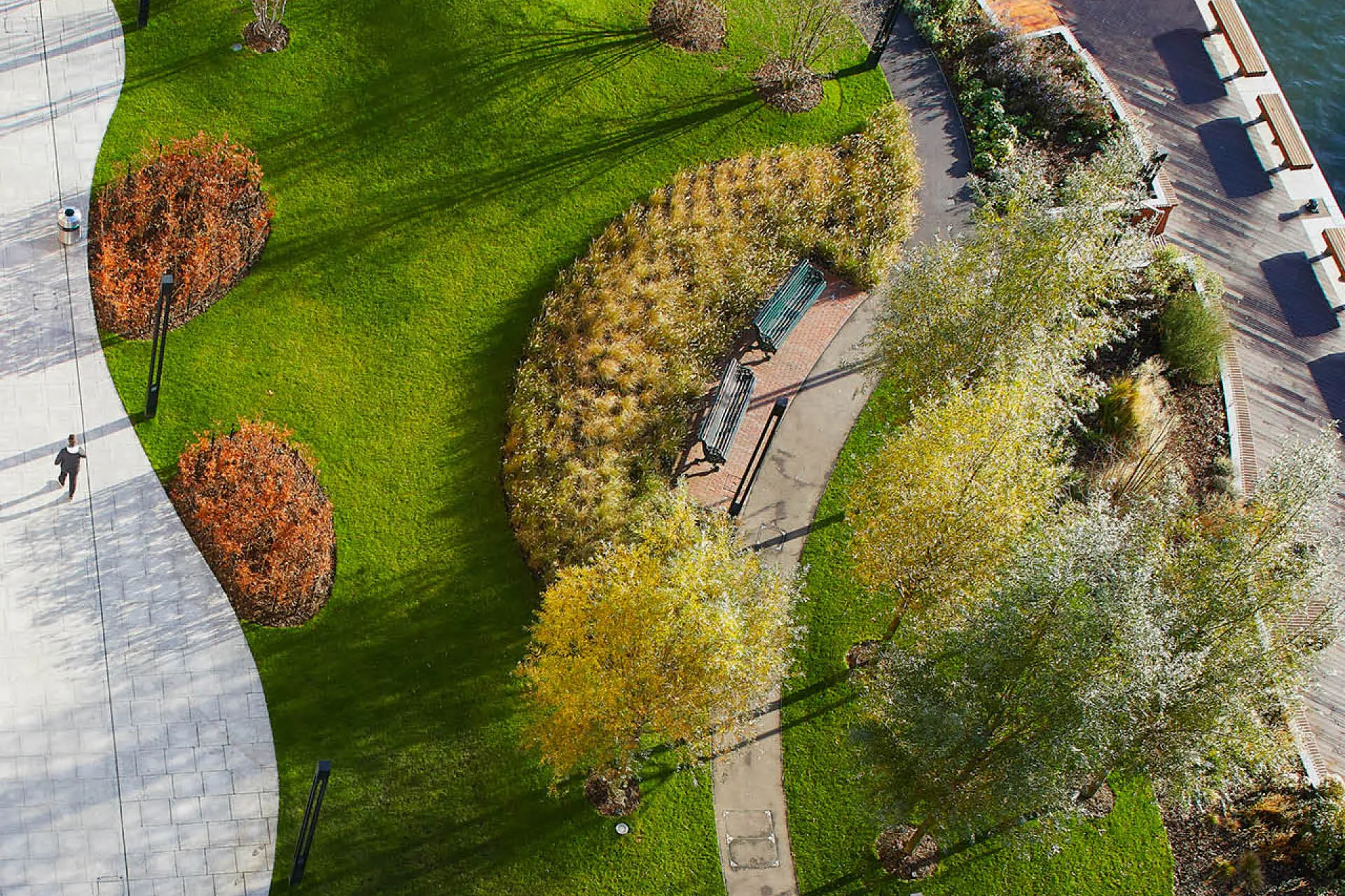 Aerial view of a landscaped garden with curved pathways