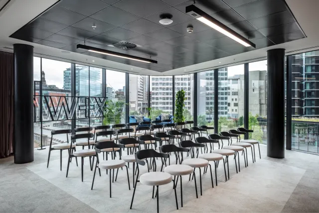 Rows of chairs in a meeting room
