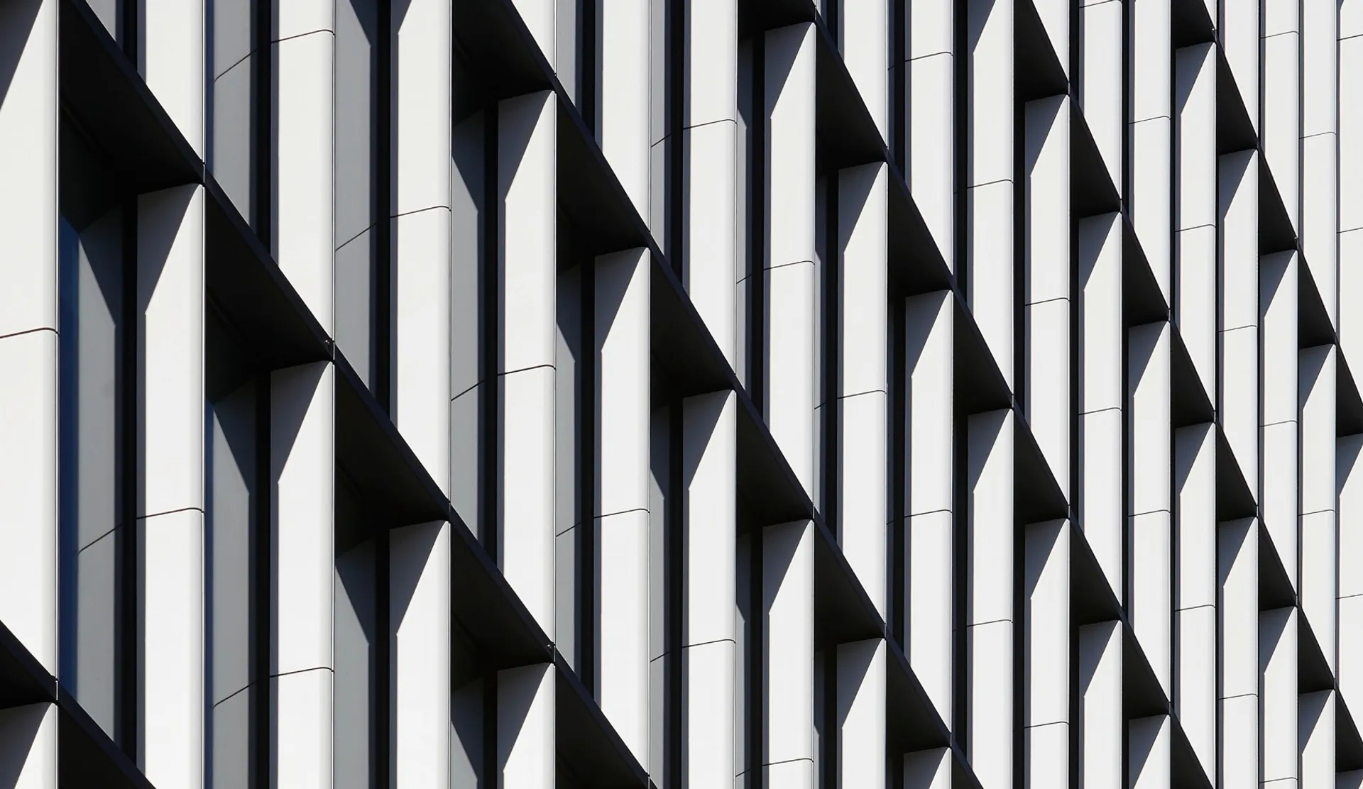 Detail looking up of windows on tall building