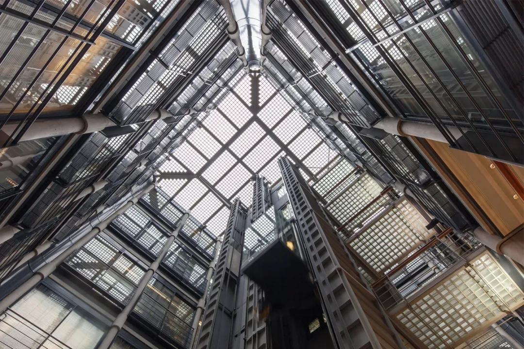 Looking up at large atrium with interior gantries