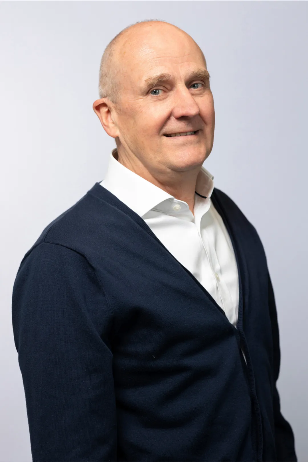 Portrait of person in white shirt and black top