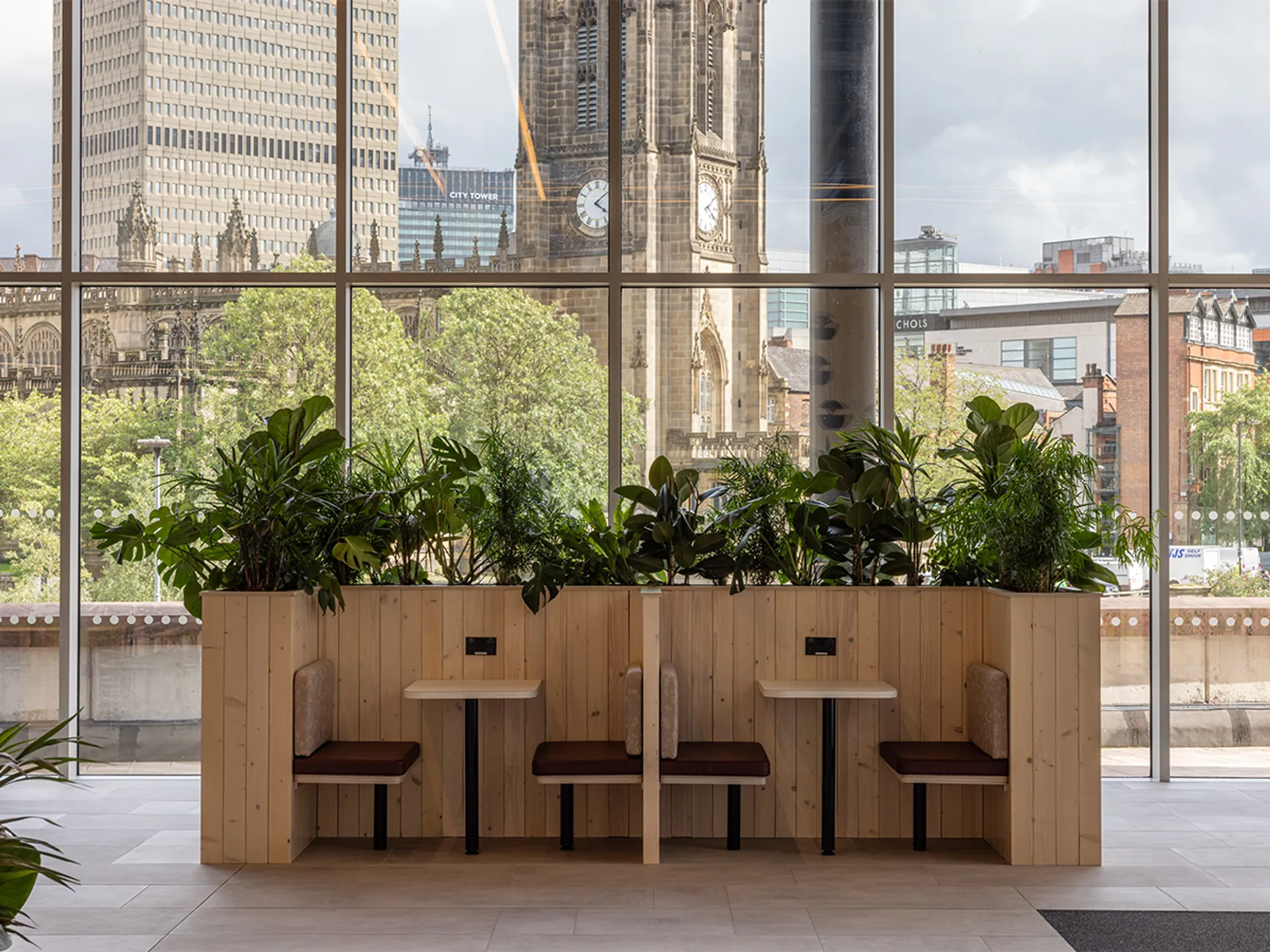 Interior view of seating area and plants. Good view onto surroundings.