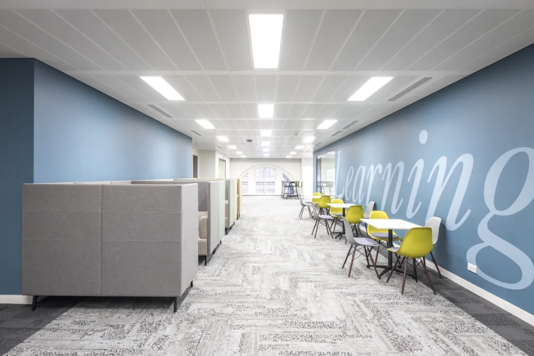 internal university corridor with chairs and tables