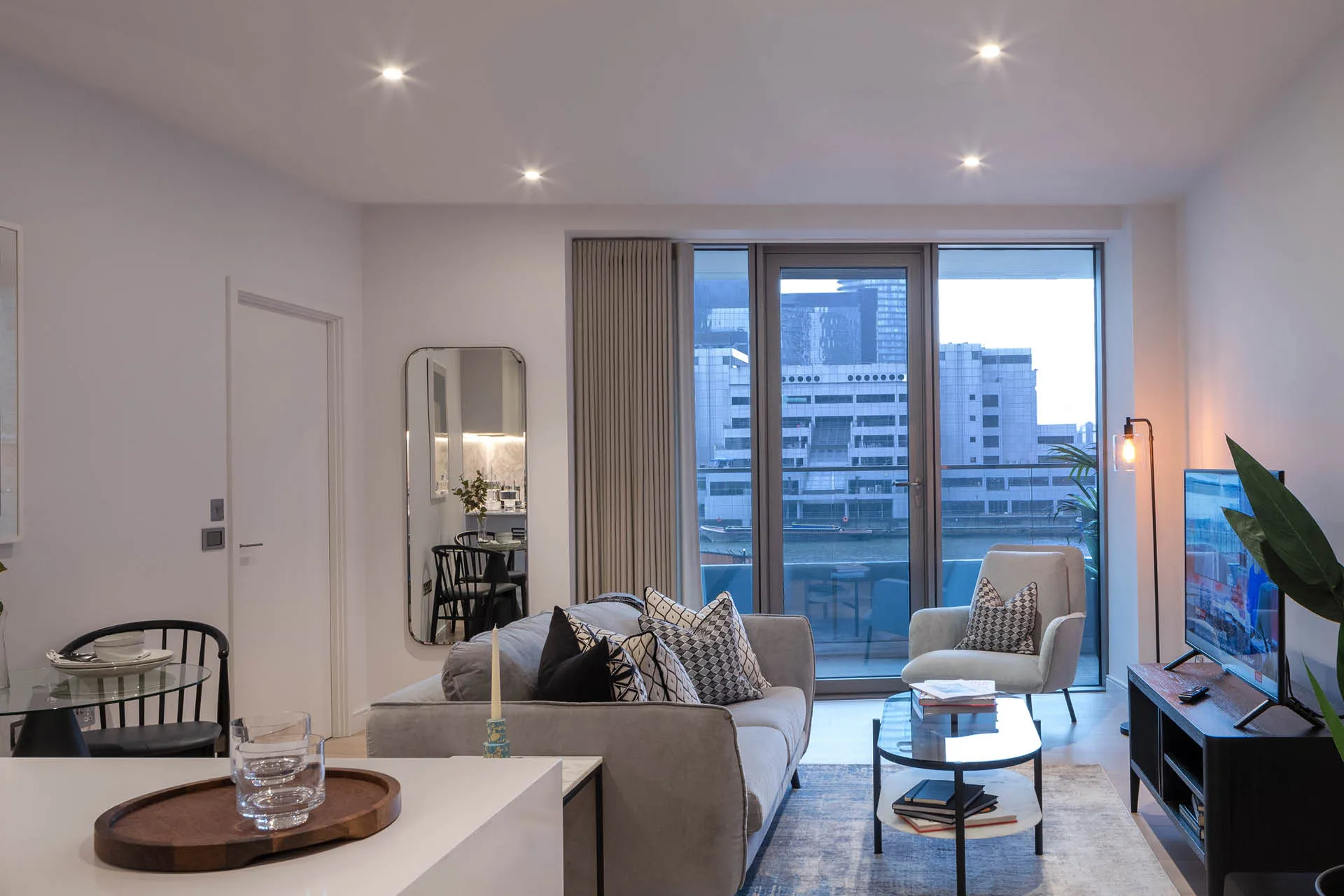 Furnished apartment living room with large windows