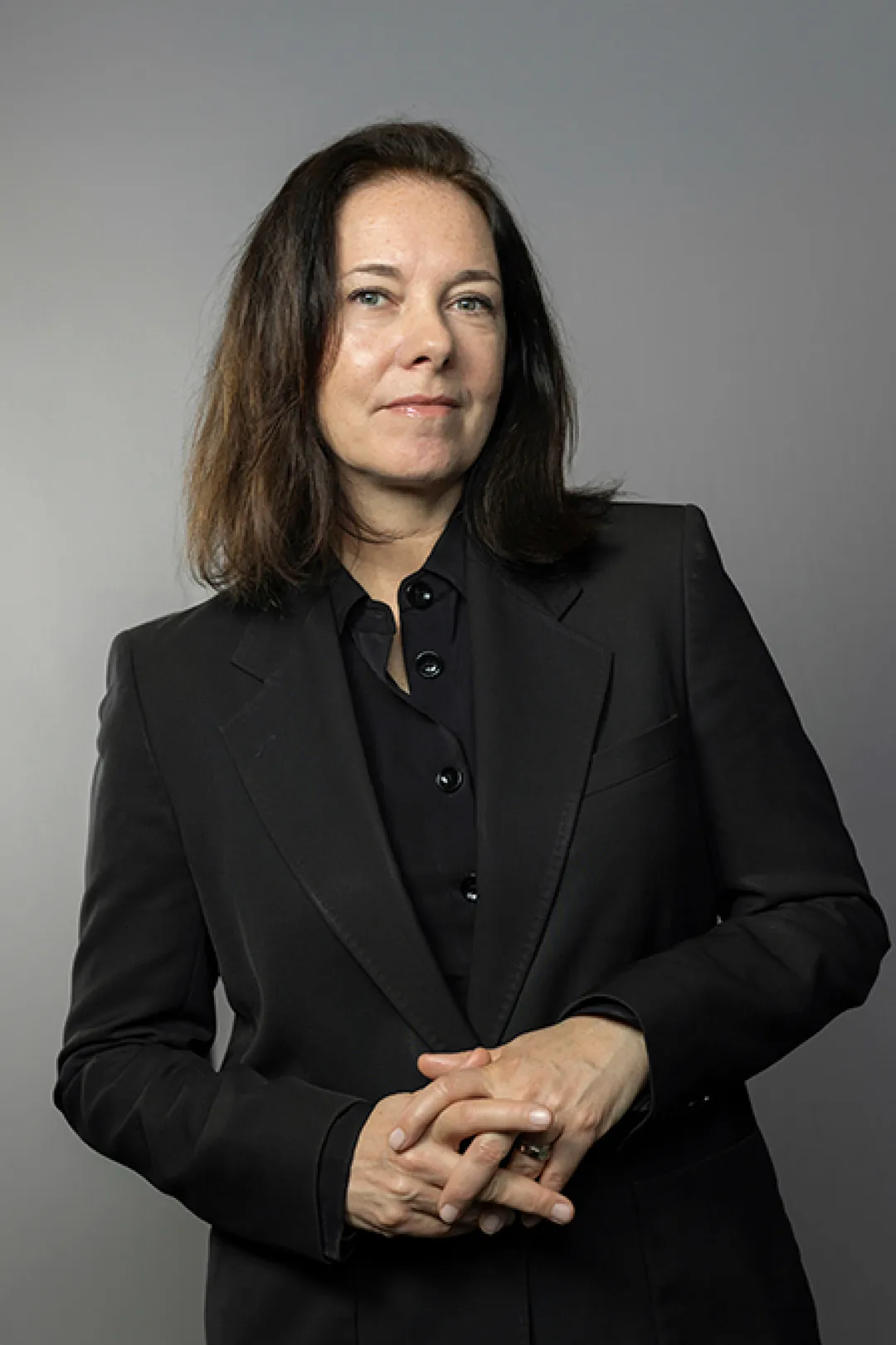 Portrait of person in black jacket