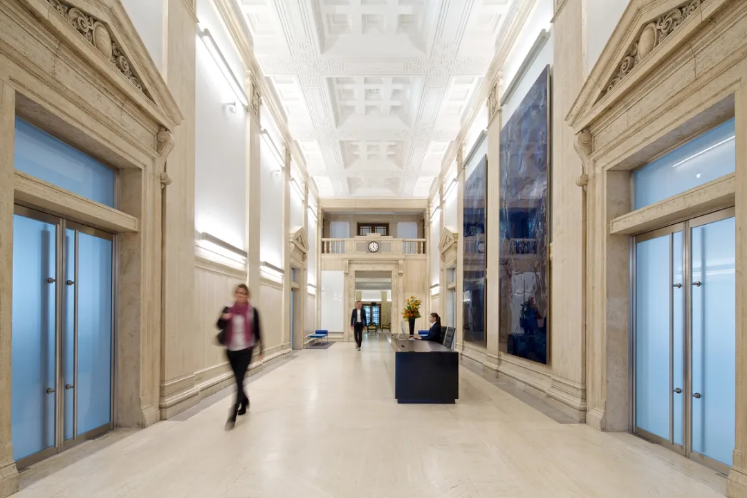 image of reception area with people walking