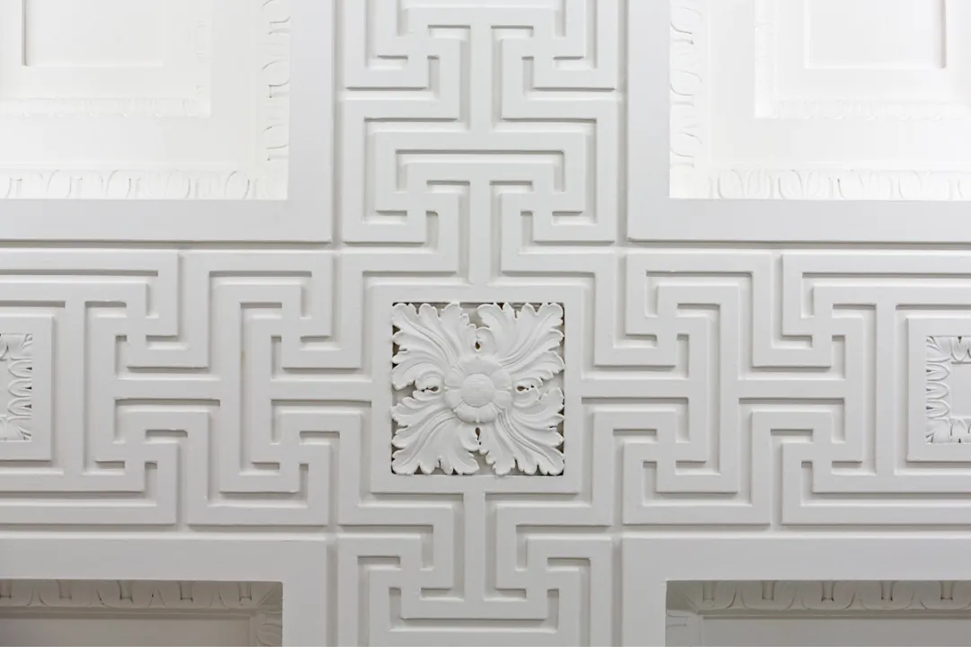 detail of ornament with cross and relief ornaments white