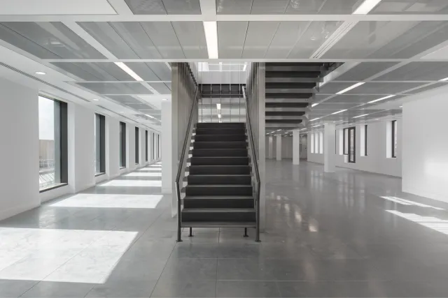 stairs in empty office space grey colours