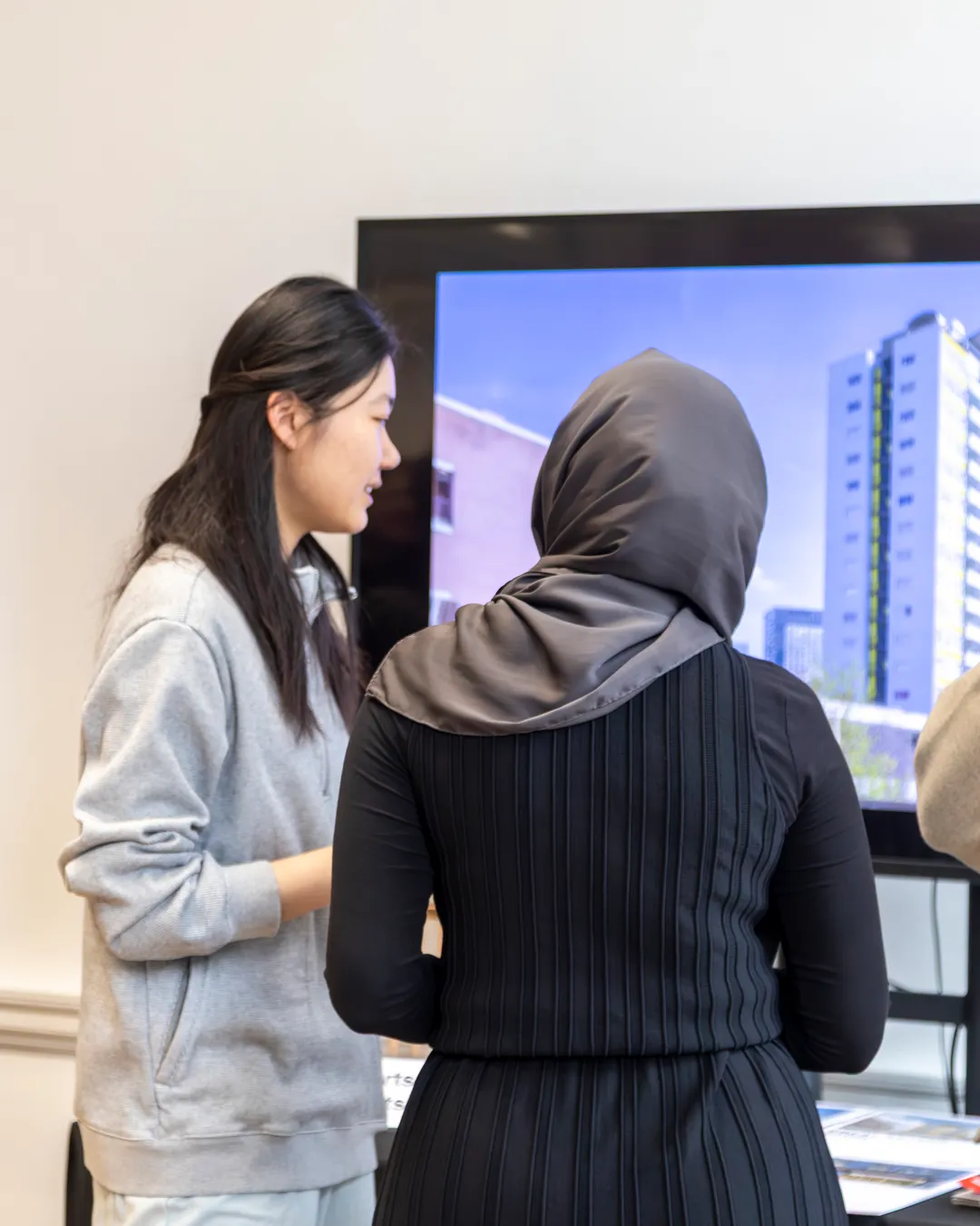 Architect talking to students