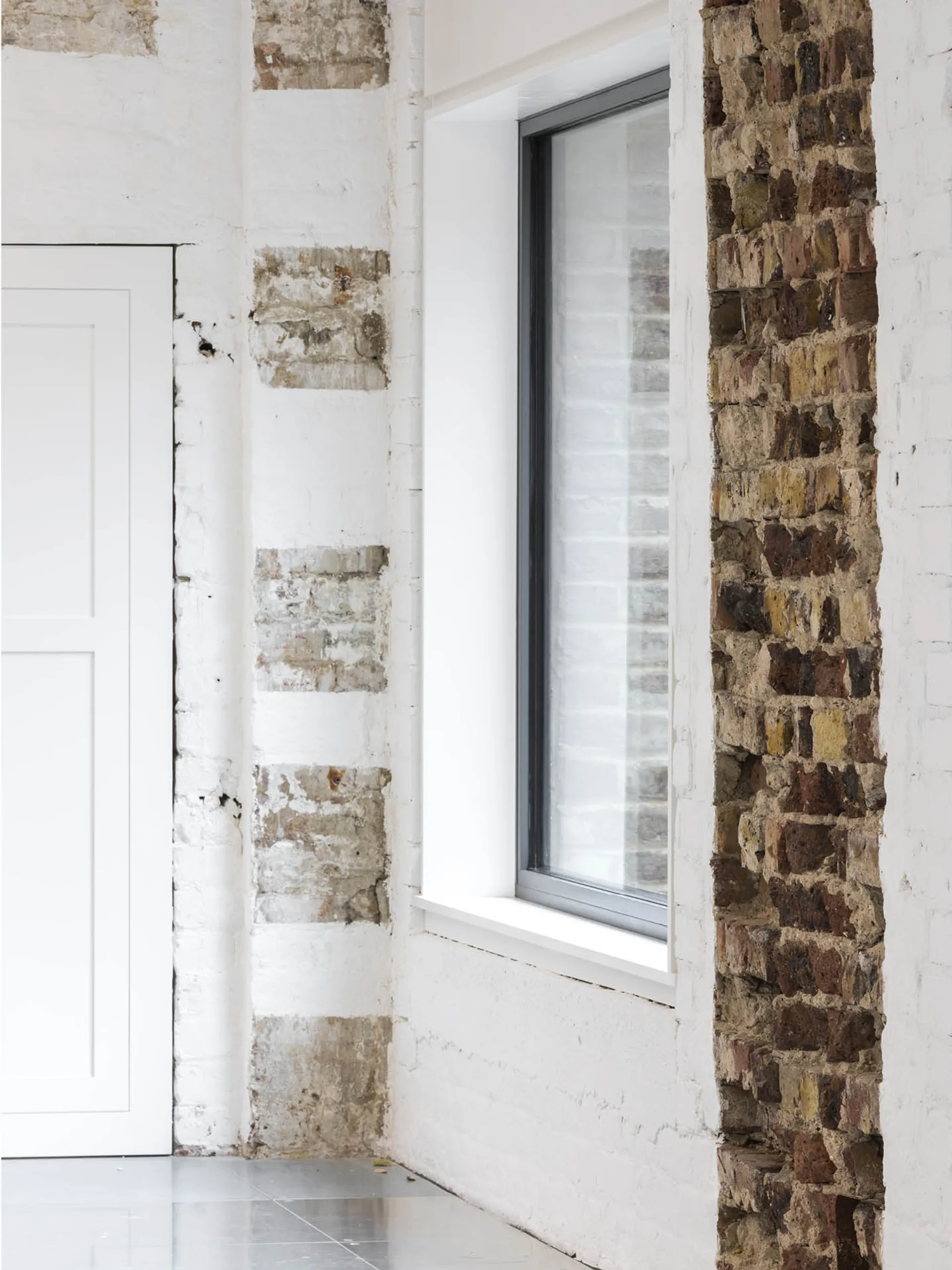 A mix of painted and exposed brick