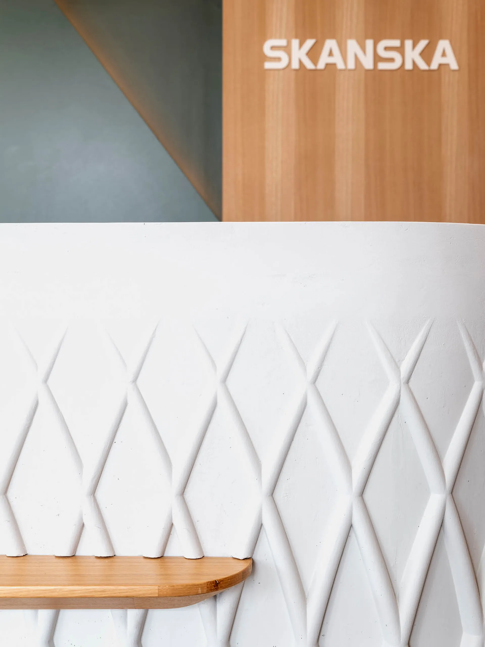 A Close up of the white patterned reception desk