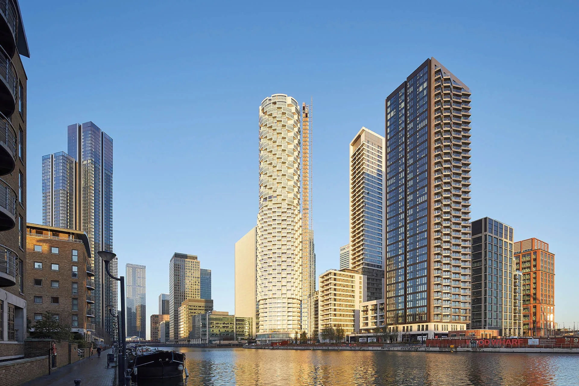 A cluster of residential towers at a rivers edge