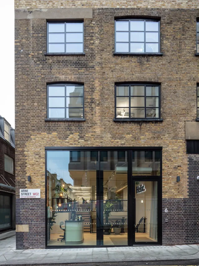 Brick warehouse exterior with shop front entrance