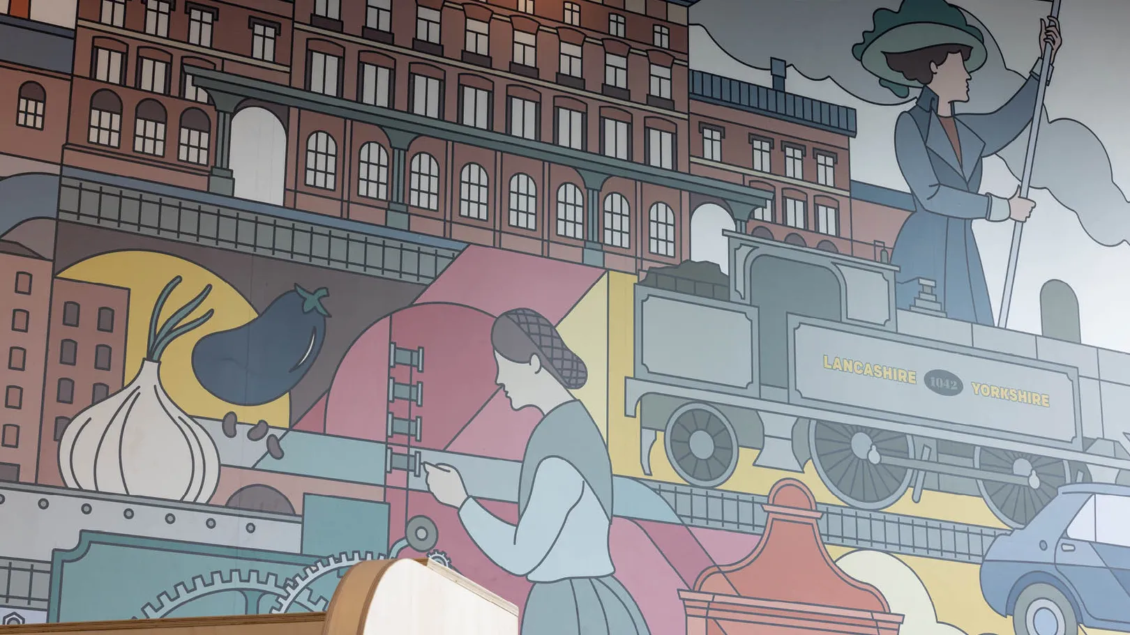 An illustrated mural of Manchester's history by Barney Ibbotson