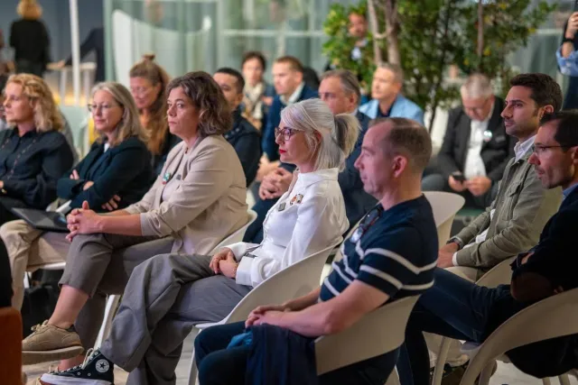 audience listening to talk