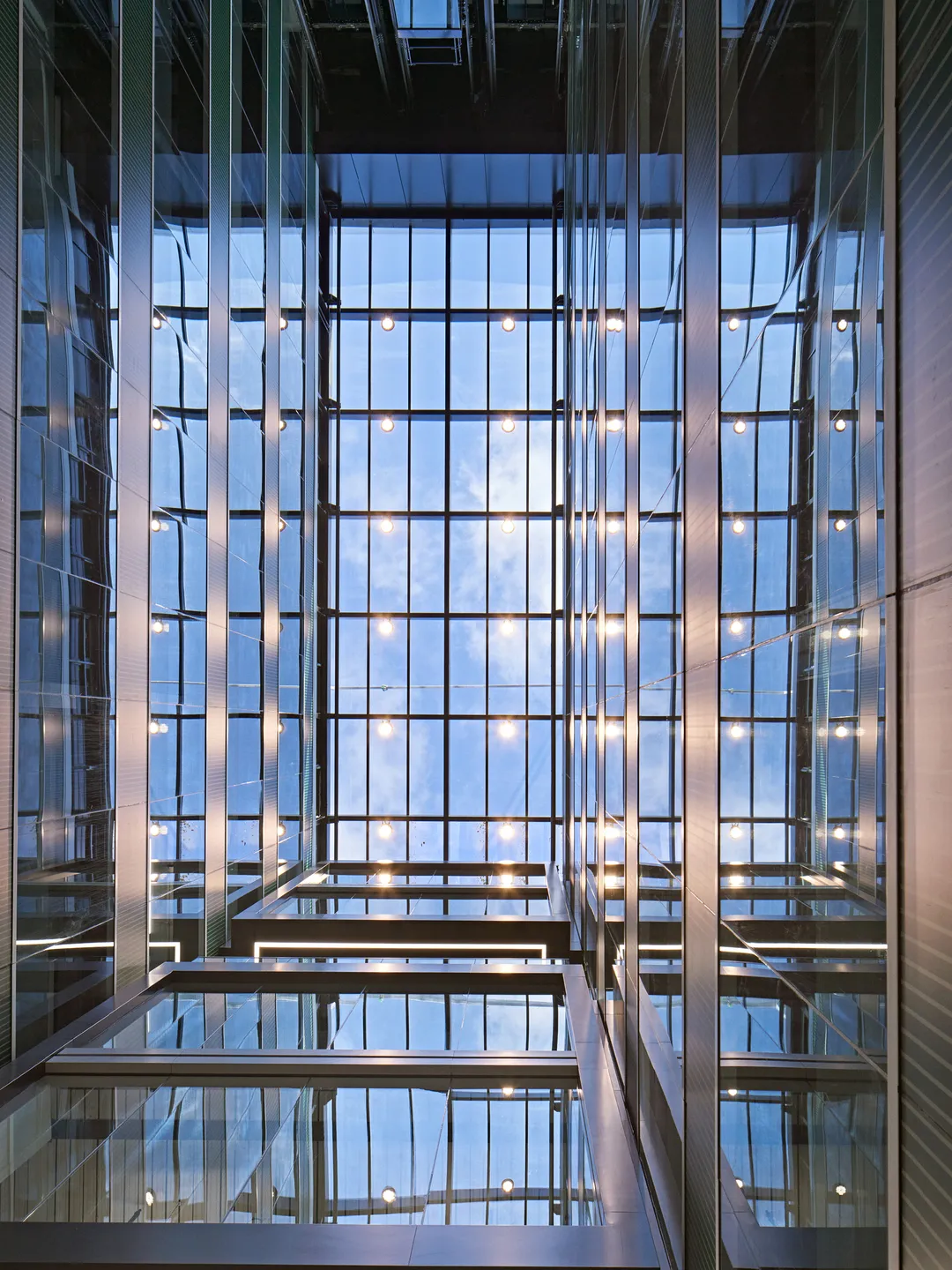 View looking up to glass roof of atrium