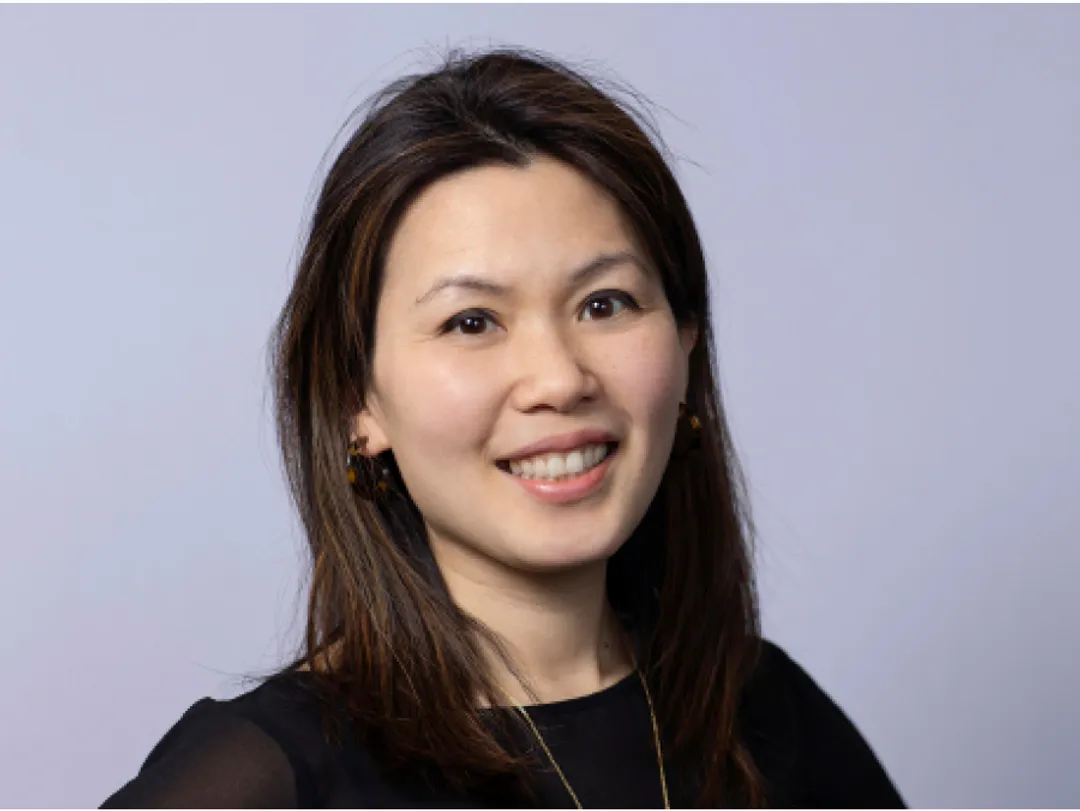 Portrait of person in black top