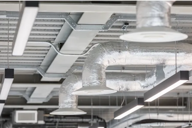 ceiling industrial aesthetics with pipes on view