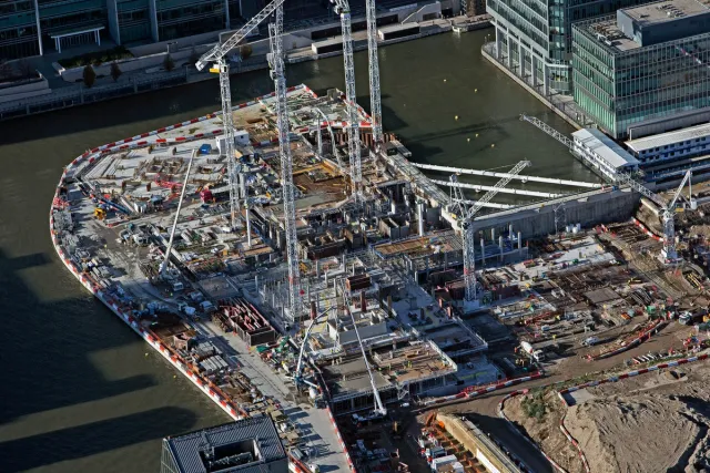 Aerial view of a building site with cranes