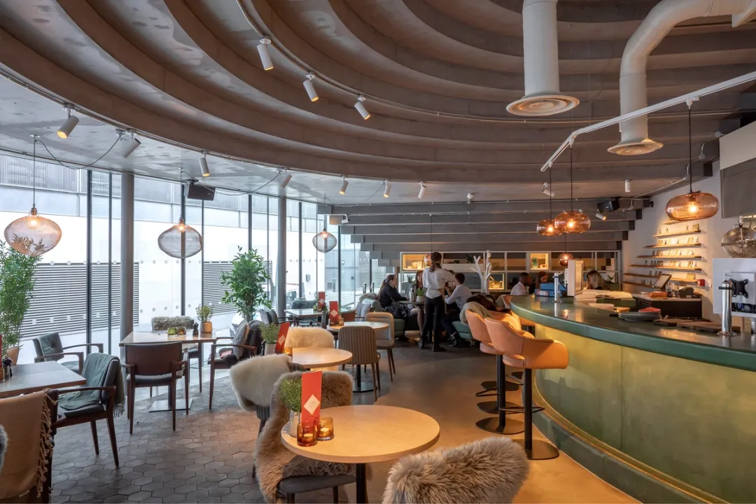 Lounge view of cafe and people eating