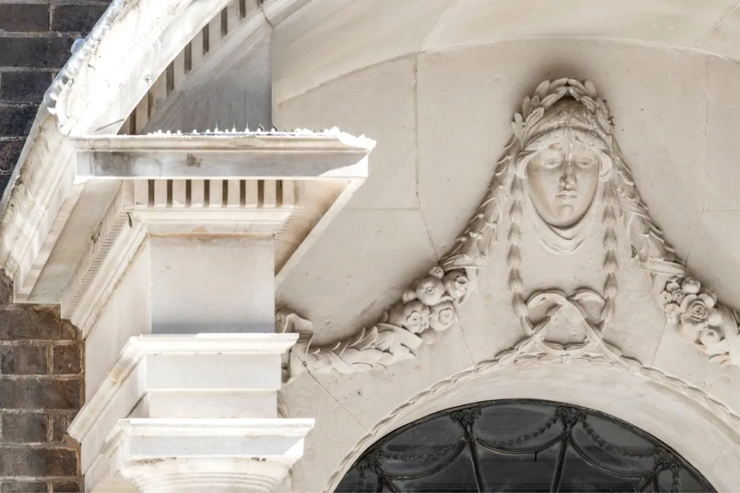 The Mercers’ Maiden seal on top of door