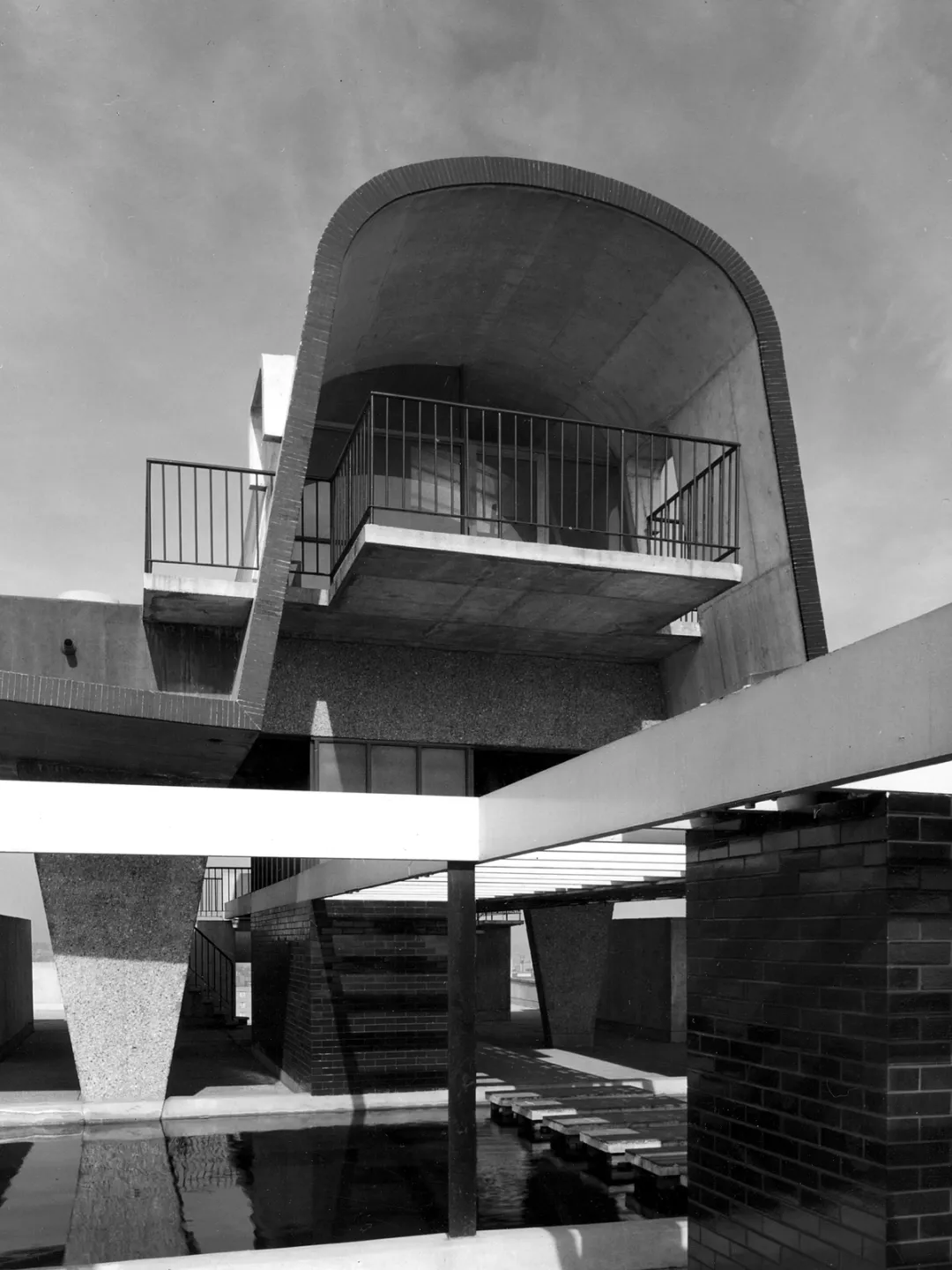 Archival black and white image of building in the 50s